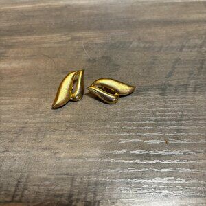 Dante clip earrings brushed shiny gold tone double scrolls